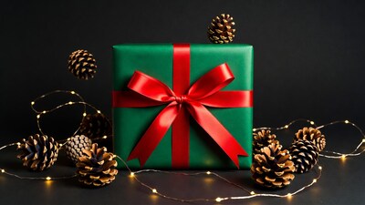 Green gift box with red bow