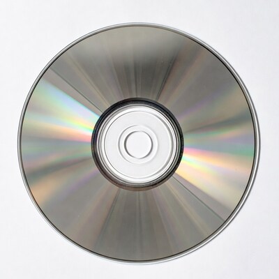 Shiny CD Disc on White Background
