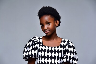 African girl in black white harlequin dress
