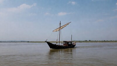 Traditional sailboat on river