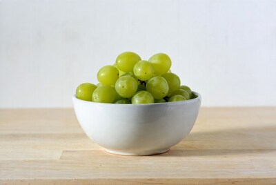 Green grapes in white bowl