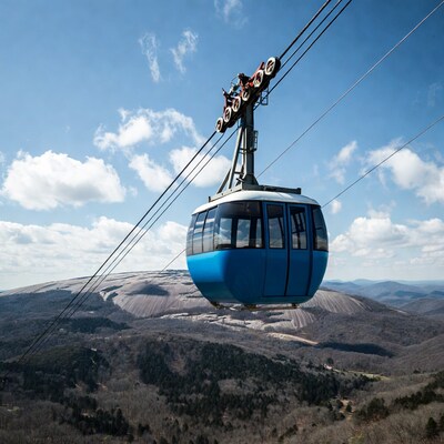 Blue cable car over Stone Mountain