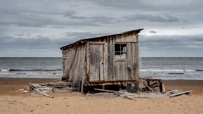 Abandoned shack on beach