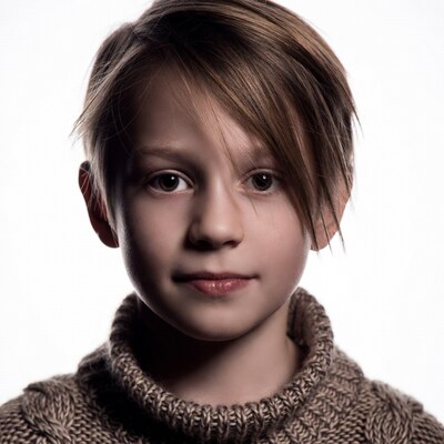 Boy with brown hair in turtleneck