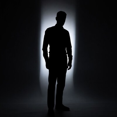 Silhouette of man in doorway