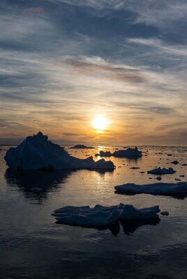 Icebergs in sunset Arctic sea
