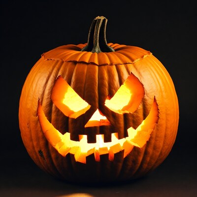 Jack-o-lantern pumpkin on black background
