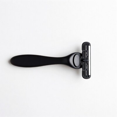 Black razor on white background