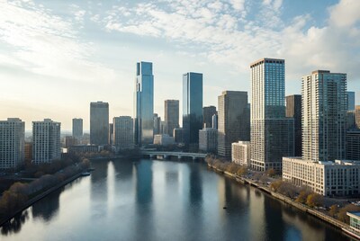 City skyline over river at sunset