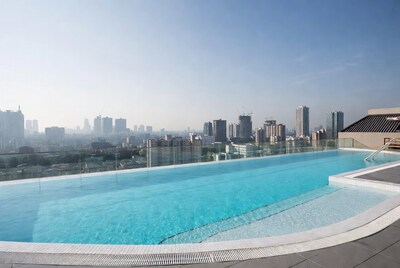 Infinity pool overlooking city skyline