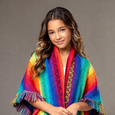 Girl in colorful Andean poncho