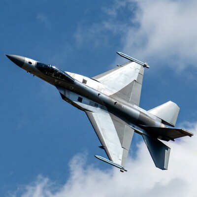 F-16 fighter jet flying in sky