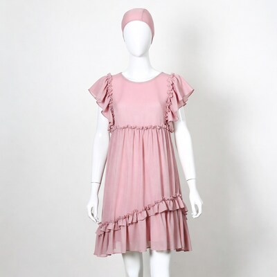 Mannequin in pink ruffle dress
