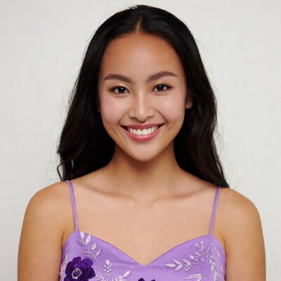 Asian girl smiling in purple dress