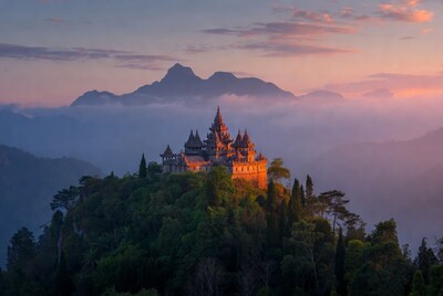 Temple atop mountain at sunset