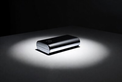 Shiny black rectangular device on table