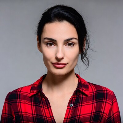 Woman in red plaid shirt close-up