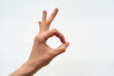 Hand making OK sign