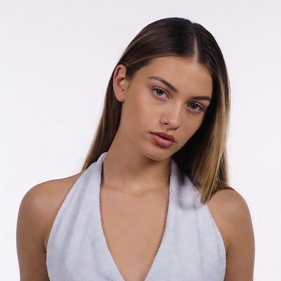 Woman in white towel dress