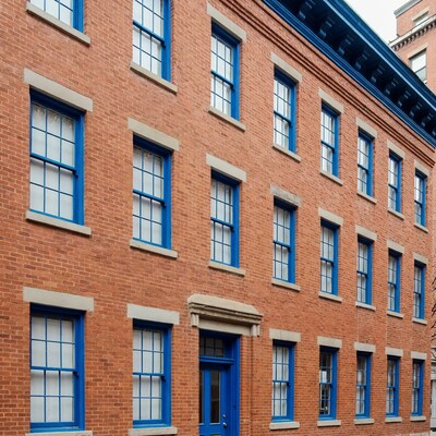 Brick Building with Blue Windows