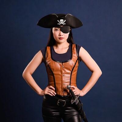 Asian woman in pirate costume