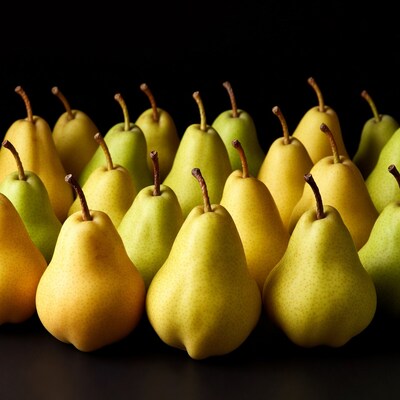 Fresh pears on black background