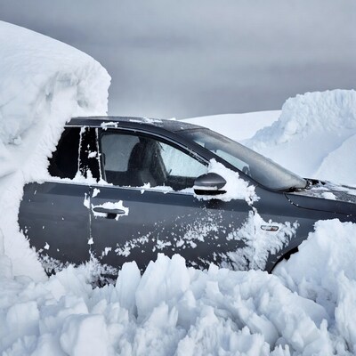 Car Buried in Deep Snow