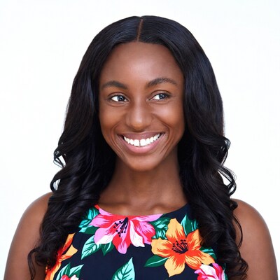 Smiling African-American woman in floral top