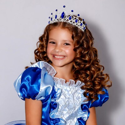 Girl in blue princess dress with crown