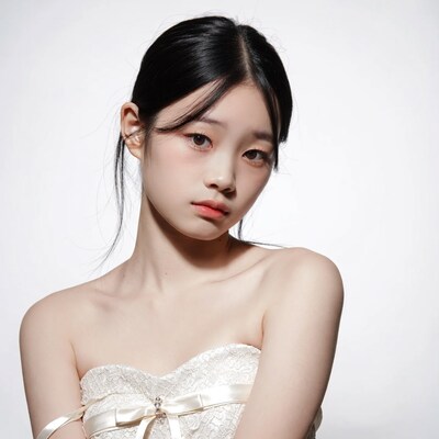Asian woman in white lace dress
