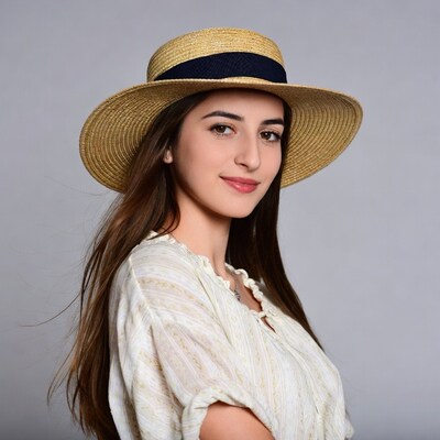 Woman wearing straw hat