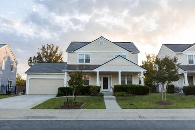 Beige suburban house with porch