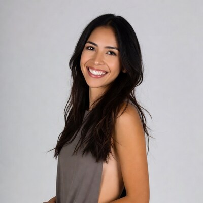 Smiling Latina woman in gray tank top