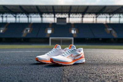 White orange running shoes on stadium track