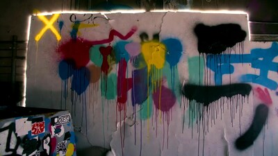 Colorful Graffiti Wall with Yellow X