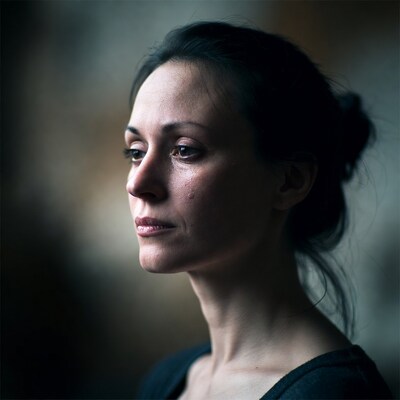 Woman with teary eyes profile