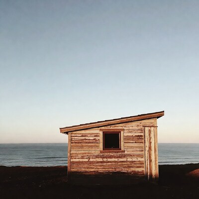 Wooden shack by ocean beach