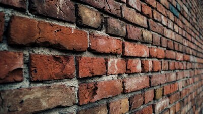 Weathered Red Brick Wall Closeup