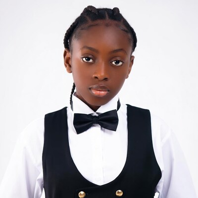 African girl in black vest bowtie
