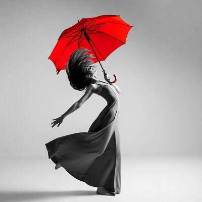 Woman dancing with red umbrella