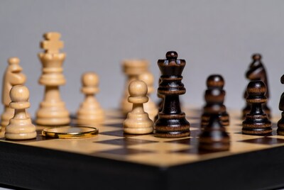 Chessboard with gold coin