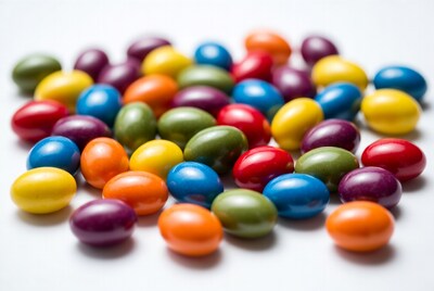 Colorful Candy Eggs on White Background
