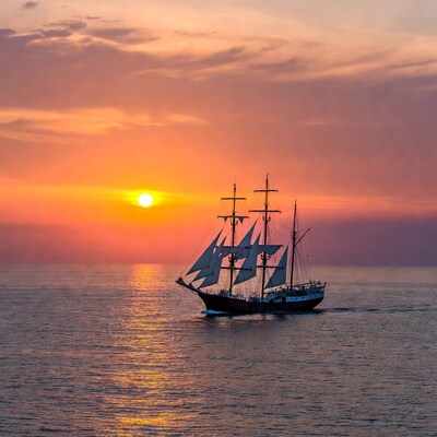 Sailing ship at sunset