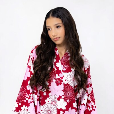 Asian girl in red floral kimono