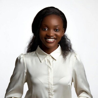 Smiling African woman in white blouse