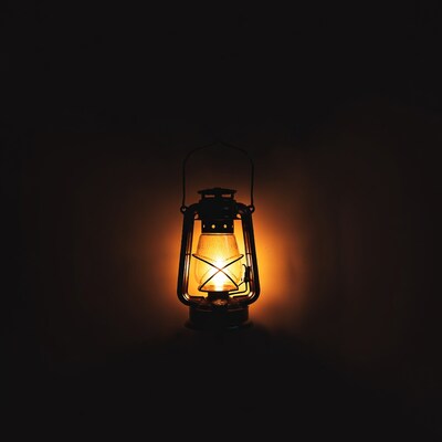 Lit Lantern on Dark Background