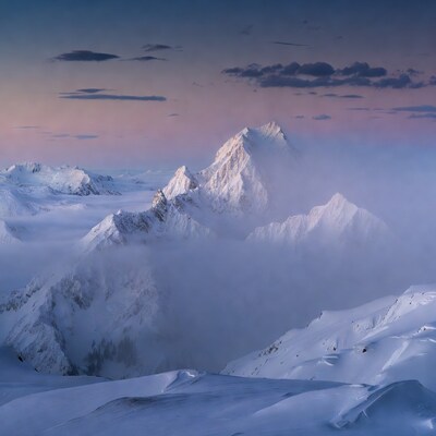 Snowy Mountains in Pink Sunset Fog
