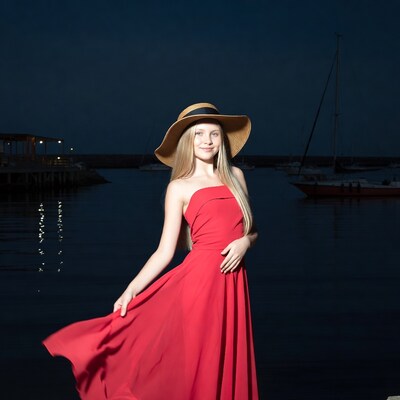 Blonde girl in red dress by marina