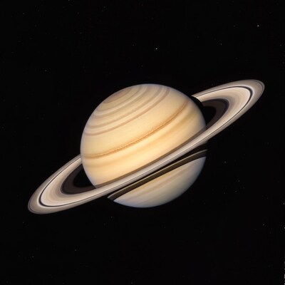 Saturn with rings in space
