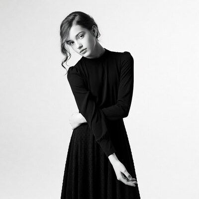 Young woman in black dress portrait